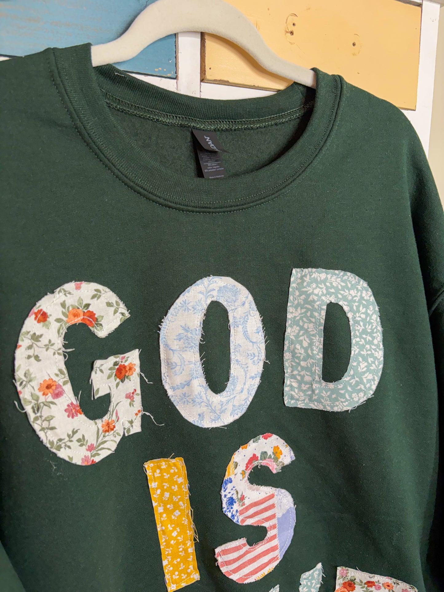 God Is Love Forest Green Patchwork Crewneck | Christian Sweatshirt | Faith-Based Cozy Pullover